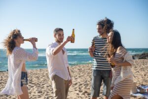 a group of friends having fun at the beach